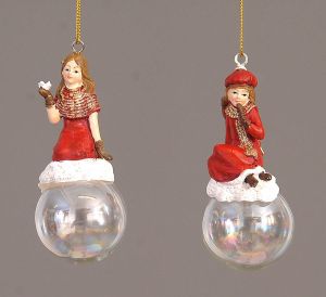 12/288-2Asst 9cm Polyresin girls w/red clothes sitting on a glass ball